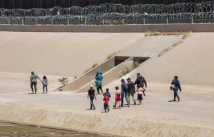 May 30, 2019: Migrants from Central America cross the U.S.-Mexico border at El Paso, Texas / Ciudad Juarez, Chihuahua, Mexico to seek asylum in the United States. Mike Hardiman/Shutterstock